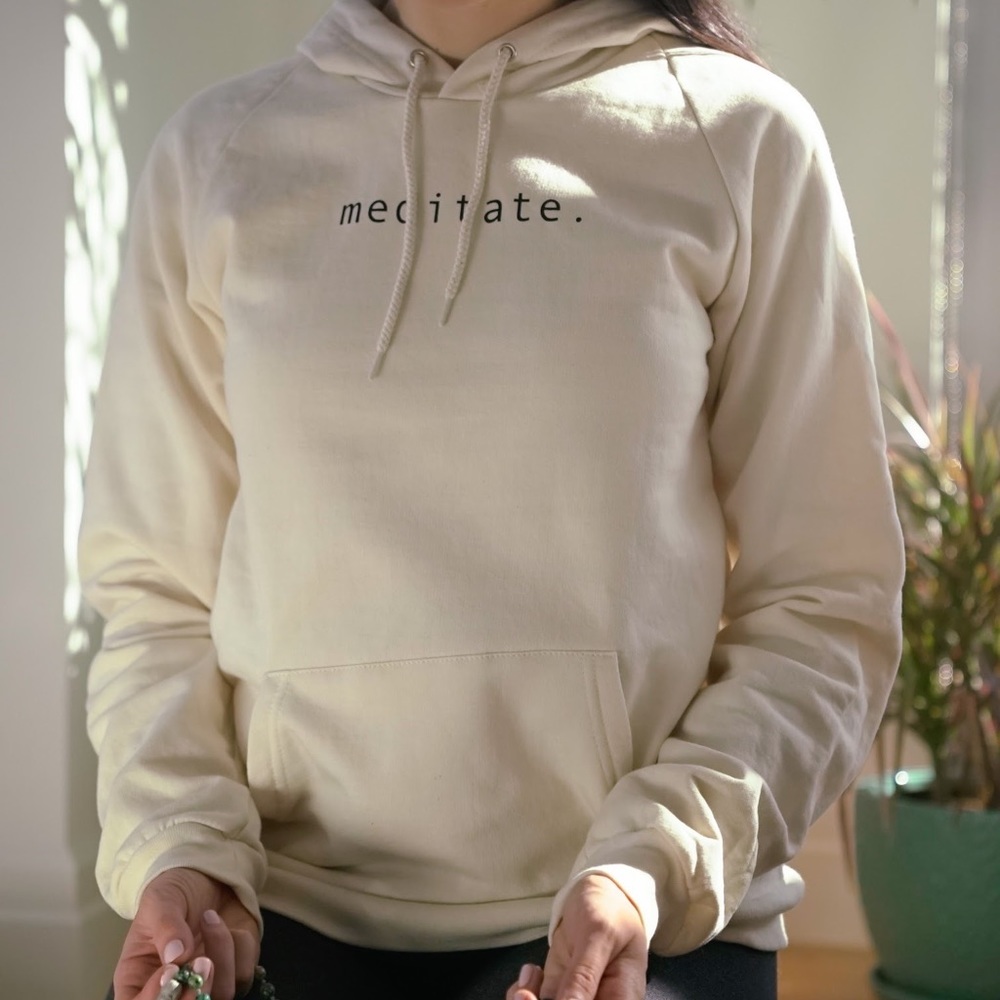 An organic hoodie ”meditate”